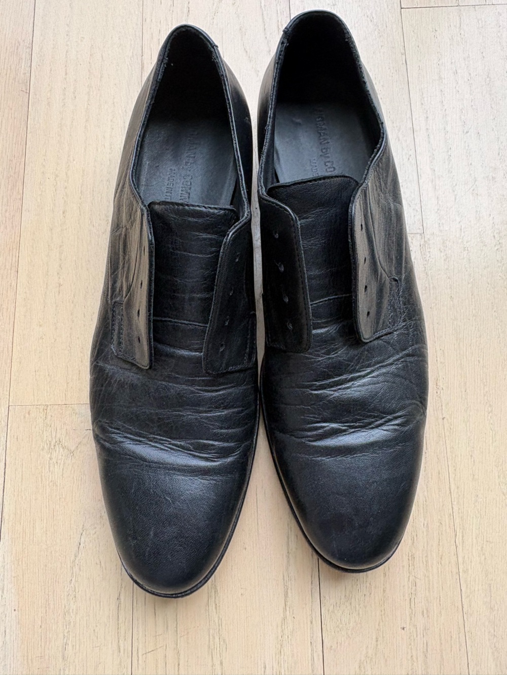 Common Projects Black Leather Slip-On Loafers — Smooth Rounded Toe